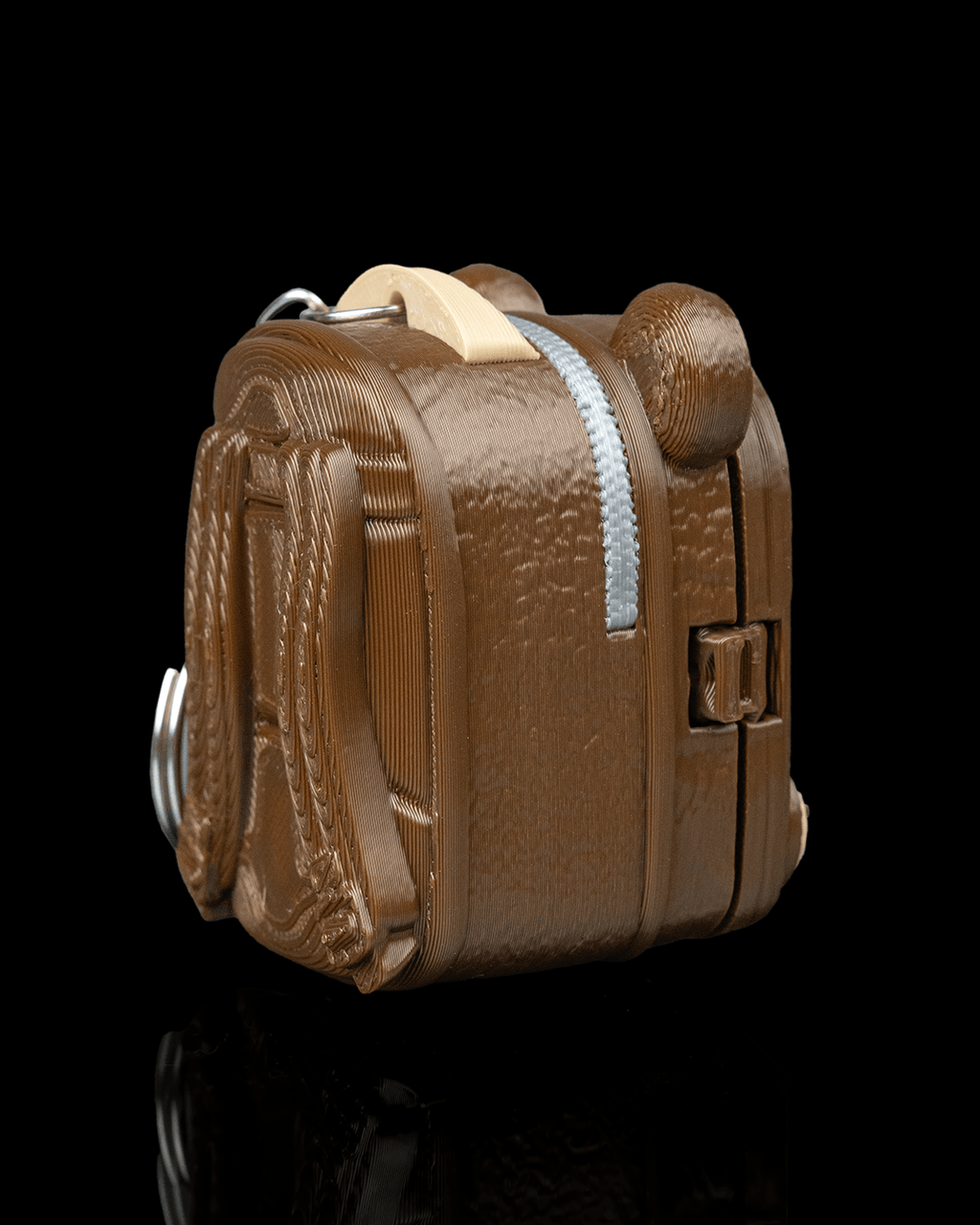 Cuddle Pack Siamese collectible 3D printed figure featuring an adorable brown backpack design.